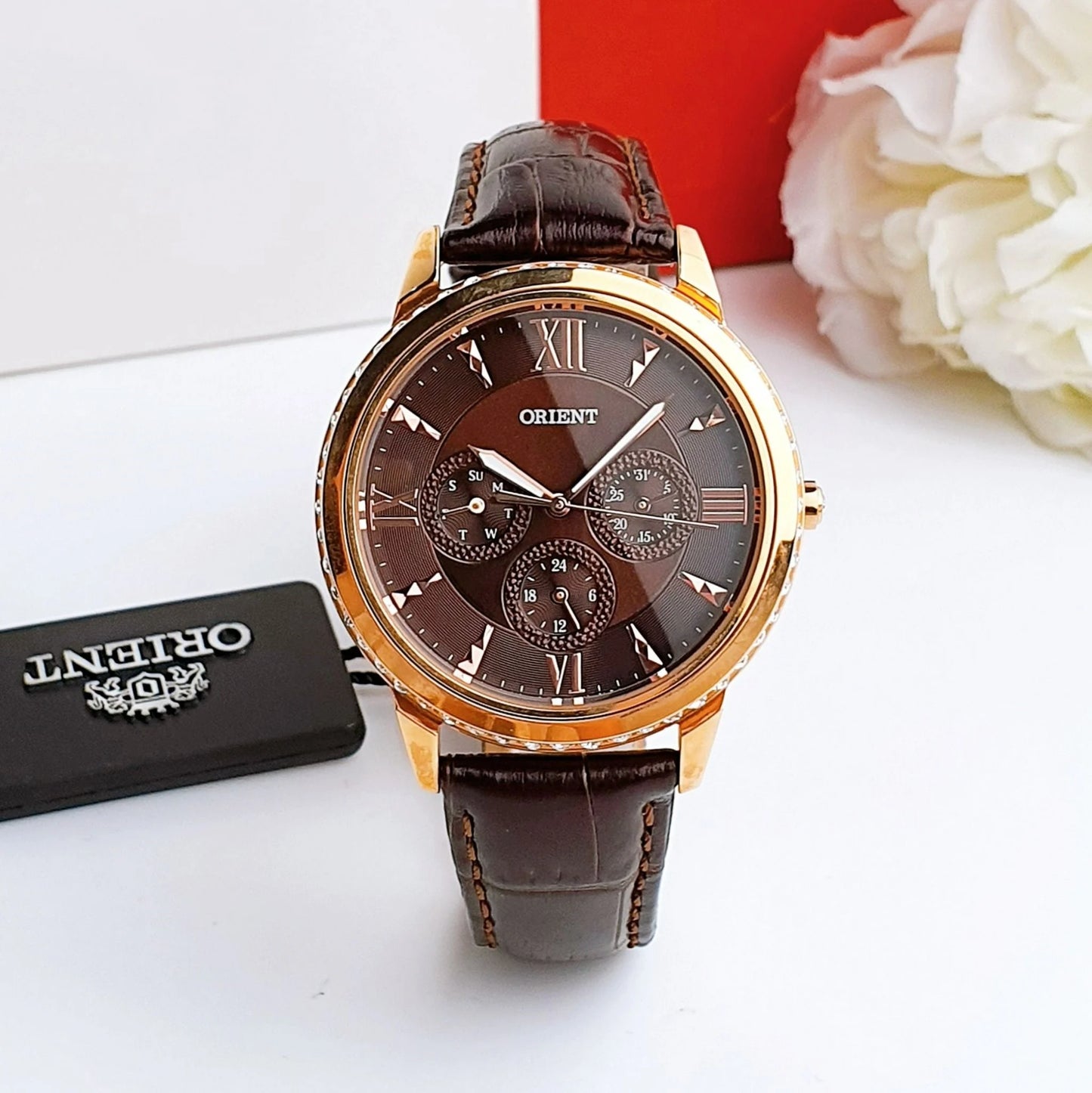 Reloj Orient Fechador de dama con circonias.